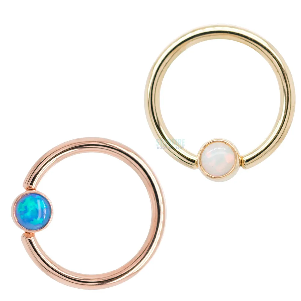 Captive Bead Ring (CBR) in Gold with Bezel-set Sky Blue Opal Captive Bead