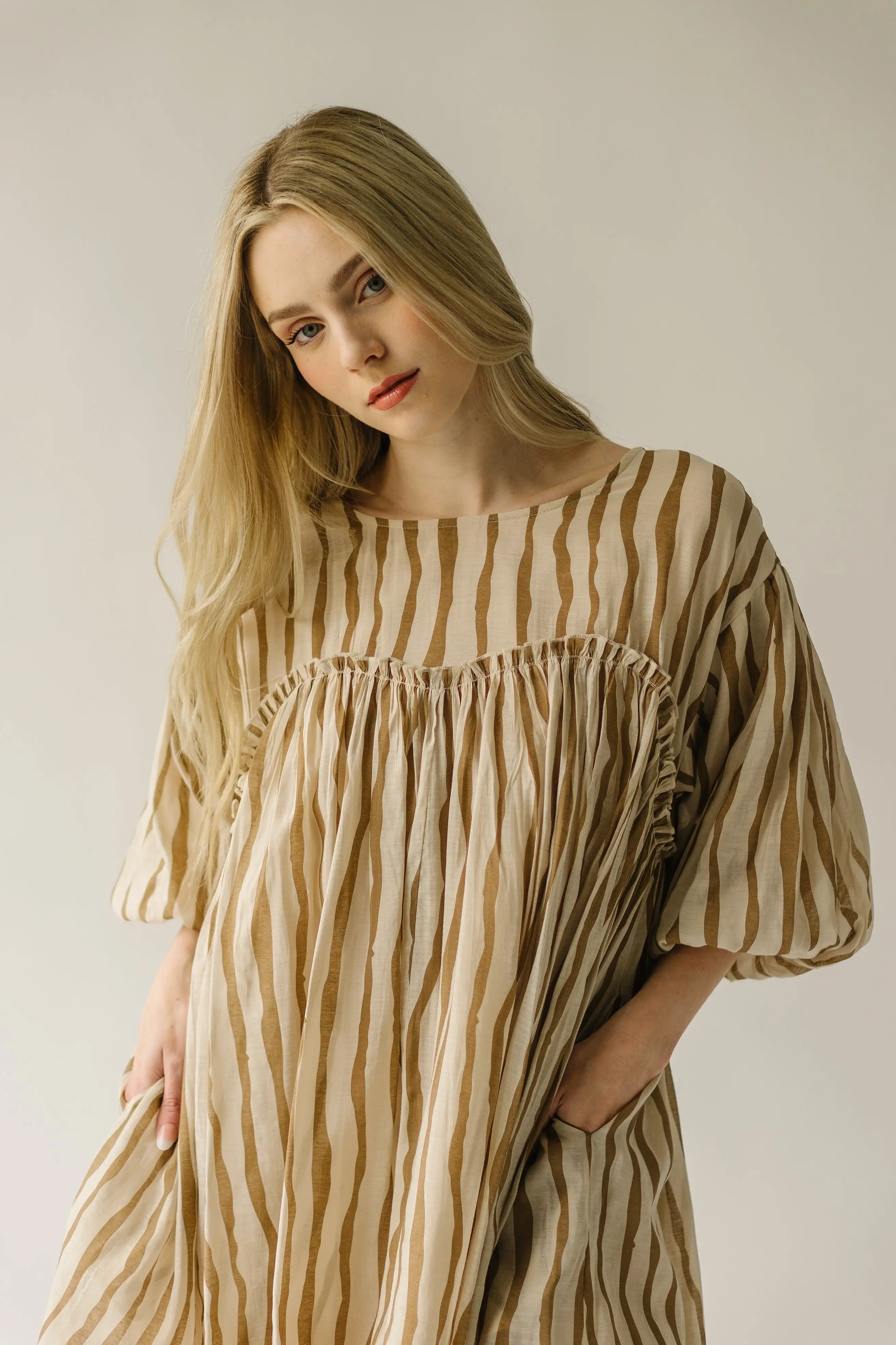 The Pampa Bubble Sleeve Babydoll Dress in Mocha Stripe